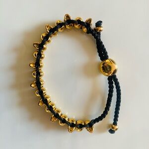 Links of London Gold and Black skull bracelet